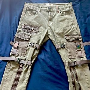 Army green cargo soft denim pants with adjustable leg straps and chains